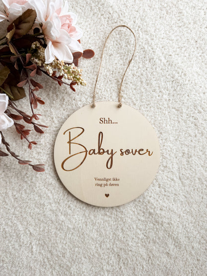 "Baby sover"-skilt