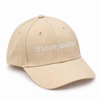 Barnecaps med teksten “Storebror"/"Storesøster”